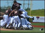  Bowling Green baseball team celebrates winning the MAC tournament championship with a victory over Ball State on Sunday.