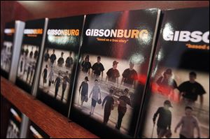Books that the movie 'Gibsonburg' was based on were for sale during Sunday's reception and private screening of the movie about the 2005 Gibsonburg High School baseball team that won a state championship.