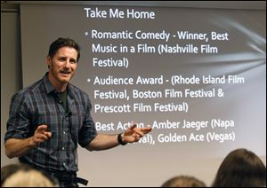 Actor and Perrysburg native Sam Jaeger speaks to an overflow crowd at the Way Public Library in Perrysburg.