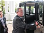  Former Florida Gov. Jeb Bush prepares to board a carriage after delivering a speech at the Mackinac Policy Conference on Mackinac Island this week.