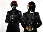  Thomas Bangalter, left, and Guy-Manuel de Homem-Christo, from the music group, Daft Punk, pose for a portrait.