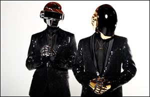 Thomas Bangalter, left, and Guy-Manuel de Homem-Christo, from the music group, Daft Punk, pose for a portrait.