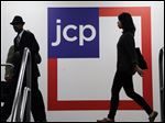  In this  Tuesday, April 9, 2013, photo, Customers shop at a J.C. Penney store, in New York. Americans cut back on spending in April after their income failed to grow, a sign economic growth may be slowing, according to data released by the Commerce Department, Friday, May 31, 2013. (AP Photo/Mark Lennihan)