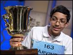  Arvind Mahankali, 13, of Bayside Hills, N.Y., holds the championship trophy after he won the National Spelling Bee by spelling the word 