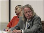  Jose Moya, Jr., 24, left, and his defense attorney, Adrian Cimerman, listen to a statement from Leandra Frankum’s family in court. Moya, Jr., was sentenced to life in prison on Friday.