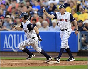 Toledo's Bryan Holaday heads to second for a double during the second inning against the Louisville on Friday night.