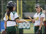  Clay pitcher Brooke Gallaher, right, talks with catcher Emily Novak in the sixth inning when Elyria scored three runs in the Division I regional final.