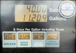 The Valero gas station on Monroe St. offers several grades of gasoline including regular and premium gas.