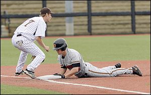 Oklahoma State's Gage Green slides into third on a triple as Bowling Green's Nick Glanzman waits for the throw during an NCAA tournament regional game.