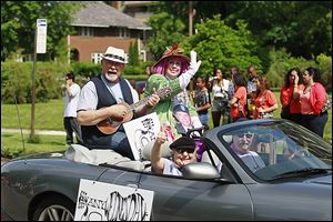 Members of Any Wednesday ride in harmony and in style during the parade Saturday at the the Historic Old West End Festival.