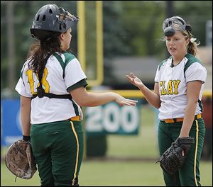 Clay pitcher Brooke Gallaher, right, talks with catcher Emily Novak in the sixth inning when Elyria scored three runs in the Division I regional final.