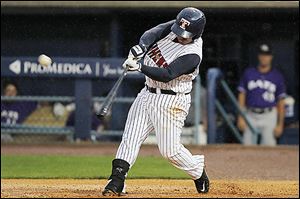 The Mud Hens’ Ramon Cabrera takes a swing while at the plate. The Toledo catcher went 1-for-4 with a two-run single in the win over Louisville.