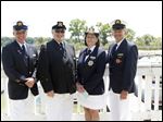  Commodores from the host clubs are, from left: J. Michael Walsh, Bay View Yacht Club, Barry Vincent, Toledo Yacht Club, Barb Pfleghaar, Toledo  Sailing Club, and Ron Reeder, Maumee River Yacht Club, during the Opening of the Port ceremony at the Maumee River Yacht Club.