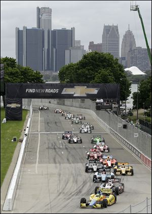 Mike Conway leads the field into turn one during IndyCar's Chevrolet Belle Isle Grand Prix on Sunday in Detroit.