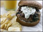  A Greek-style turkey burger with pepperoncini sauce.