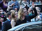  Angelina Jolie and Brad Pitt arrive at the World Premiere of 'World War Z' in London on Sunday. 