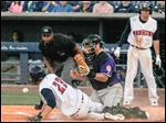  Toledo's Nick Castellanos scores as Louisville catcher Konrad Schmidt drops the throw in the sixth inning.