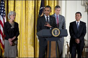 President Obama, accompanied by, from left, Health and Human Services Secretary Kathleen Sebelius, Education Secretary Arne Duncan, and Veterans Affairs Secretary Eric Shinseki, speaks during opening remarks of the White House mental health conference today in Washington.