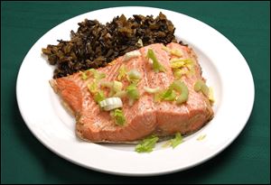 Steamed wild salmon with brown rice and celery.