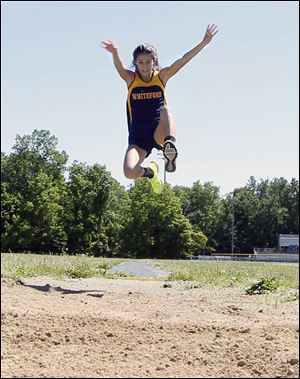 Whiteford junior Miranda Johnson set a Michigan Division 4 state meet record at 18 feet, 2½ inches to defend her championship in the long jump. She also won the 200 meters in 25.94 seconds and finished runner-up in the 100 (12.86).