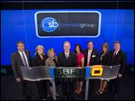  Mark A. Klein, president and CEO of SB Financial Group, presides over the NASDAQ stock market closing bell. Shown at the closing bell are, from left, Jon Gathman, senior lender; Keeta Diller, director of operations; Pam Benedict, residential real estate manager; Mr. Klein; Nichole Wichman, market and sales strategist; Tony Cosentino, executive vice president and CFO; Kristen Nusbaum, chief retail/deposit officer; and Craig Kuhlman, executive vice president, wealth management.