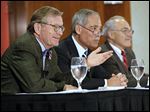  OSU President Gordon Gee, left, explains his decision to retire as board Chairman Robert Schottenstein, center, and Provost Joseph Alutto listen Wednesday.