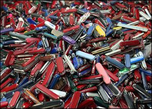 John Pistole, the head of the Transportation Security Administration (TSA) says he's dropping a proposal that would have let airline passengers carry small knives, souvenir bats, golf clubs and other sports equipment onto planes