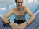  Ryan Stevens of Maumee uses the Wolf Creek YMCA in Springfield Township to prepare to swim across the Great Lakes to raise awareness for Crohn’s disease, with which he was diagnosed in 2009.