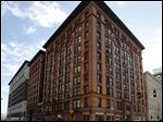  The Spitzer Building in Toledo failed its fire alarm inspection and would need additional personnel to stay open around the clock.