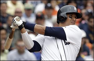 Detroit Tigers' Victor Martinez hits a two-run home run against the Tampa Bay Rays in the fourth inning in Detroit today.
