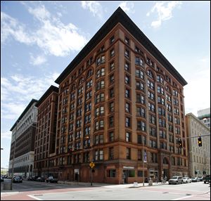 The Spitzer Building in Toledo failed its fire alarm inspection and would need additional personnel to stay open around the clock.