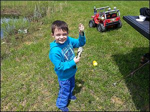 Five-year-old Cash Dotson of Swanton shows off his first bass, a largemouth, caught in his grandfather’s pond near Swanton. Cash snagged it with a night crawler fished under a bobber.