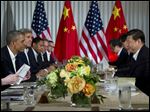  President Barack Obama sits across the table from Chinese President Xi Jinping at the Annenberg Retreat at Sunnylands as they meet for talks.