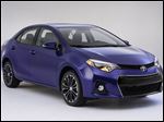  Toyota's new Corolla, revealed Thursday in Santa Monica, Calif., is aimed at shedding a low-cost image and attracting new, younger buyers.