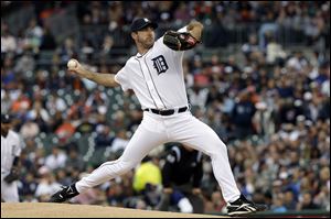 Detroit Tigers pitcher Justin Verlander throws against the Cleveland Indians in the first inning.
