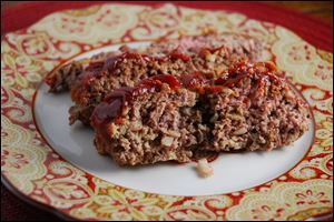 Old-fashioned all beef meatloaf is a weekly dinner tradition for many families.
