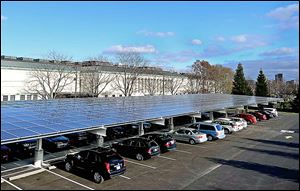 The solar canopy in the Toledo Museum of Art parking lot is in addition to panels on the roof. Along with energy-efficiency measures, they helped the museum create excess power two days.