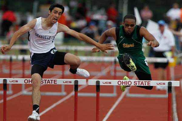 Start-s-Dionte-Carey-competes-in-the-300-meter-hurdles