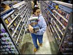  Tonya Thomas, of Russellville, Ky., makes her way through the aisles at Best Buy in Bowling Green, Ky. 