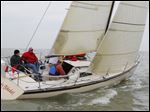  The Holy Toledo heads out during the start of the PHRF E & F class of the Governor's Cup Course in the Mills Trophy Race, Friday, June 7, 2013. 