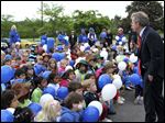  This photo released by the Ohio Attorney General shows Mike DeWine joining students at the Columbus Preparatory Academy.
