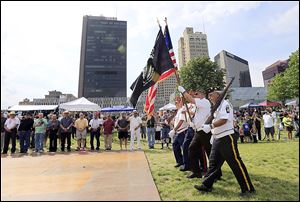 Lou Diamond Marine Corp League 272, Toledo, presents the colors at the Midwest LatinoFest at Promenade Park. 