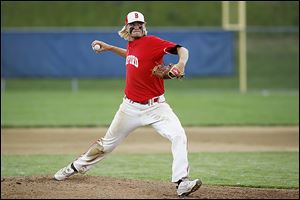 Bedford senior Kyle Kuhr pitches against Belleville in a Division 1 regional final. The Mules (30-7) will play Tuesday against Howell in the state quarterfinals.