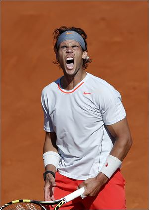 Spain's Rafael Nadal broke the men's record for match wins at Roland Garros, where he improved to 59-1, with his lone defeat against Robin Soderling in the fourth round in 2009. 