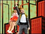  Neil Patrick Harris, who returned as emcee for the fourth time, performs with cheer-leaders for a number.