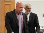  P.J. Kapfhammer, left, with attorney Jon Richardson, was found guilty of disorderly conduct in Maumee Municipal Court Monday. 