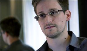 Edward Snowden worked as a contract employee at the National Security Agency in Hong Kong. The Guardian identified Snowden as a source for its reports on intelligence programs after he asked the newspaper to do so on Sunday.