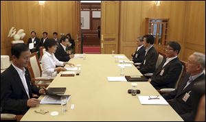 South Korean President Park Geun-hye, second from left, presides over a security meeting to discuss the upcoming South and North Korea talks at the presidential house in Seoul, South Korea.