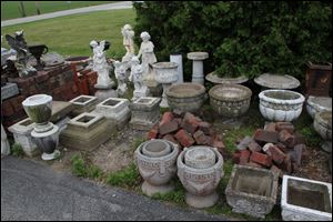 Stolen cemetery items at Jeffrey Huey's residence in Clyde. Police allege Mr. Huey stole dozens of items from area cemeteries, including items from the Oakland Cemetery in Sandusky.