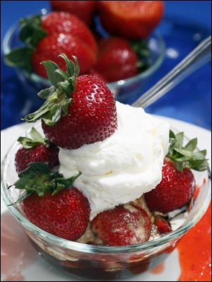 Vanilla ice cream with strawberries and balsamic vinegar.